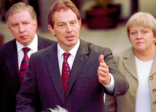 Prime Minister Tony Blair speaks to reporters about Benny Hill's alleged videotaped improprieties.
